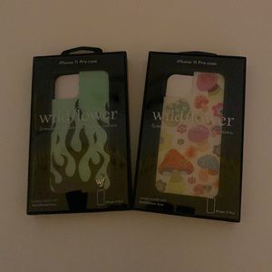 two iphone eleven pro wildflower cases